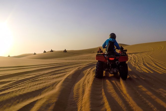 2hr COMBO - 1hr Lie-down Sandboarding and 1hr Quad Bike ride - Riding a quad bike across the dunes