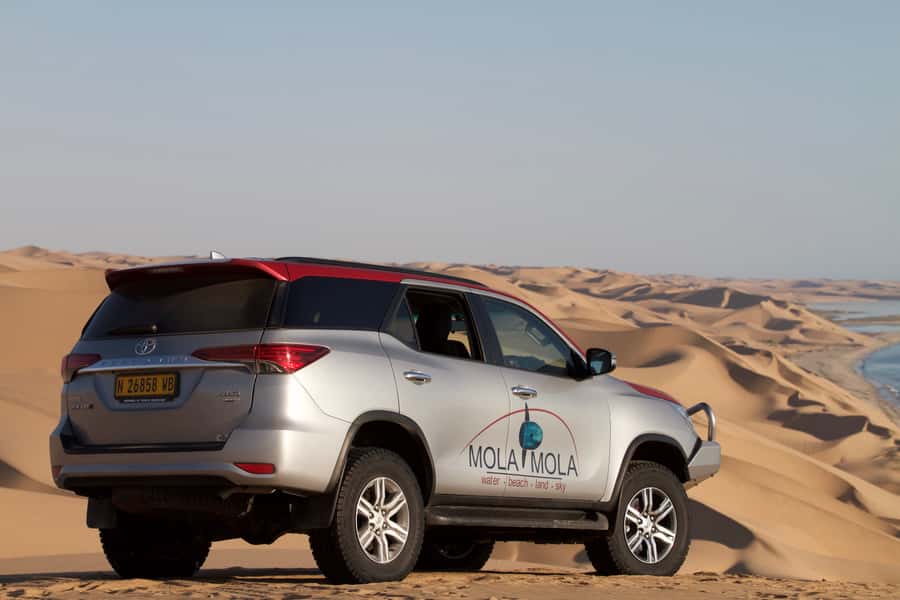 From Walvis Bay: Sandwich Harbor 4x4 Tour - The 4x4 run over soft beach sand