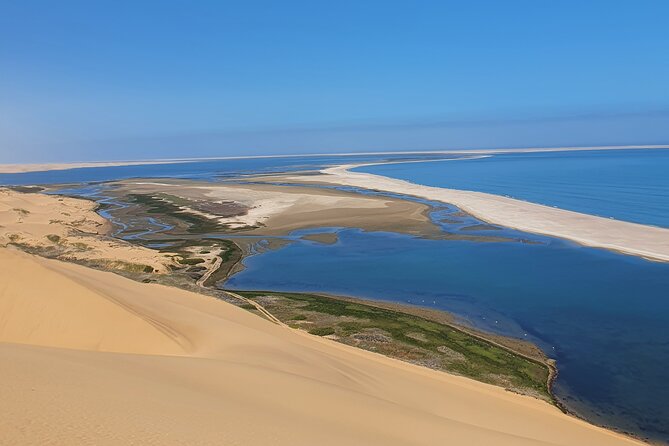 Sandwich Harbour 4x4 guided tours.Join us for an awe inspiring adventure. - Photo stops where desert meets sea