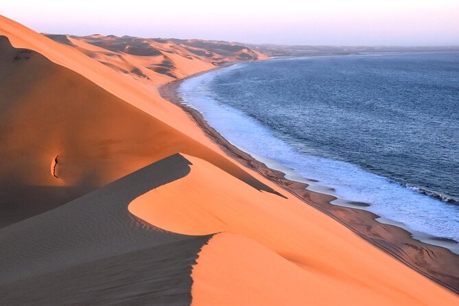 Sandwich Harbour Scenic Excursion - Design for the Cruise Ships - Beach driving where the desert meets the sea