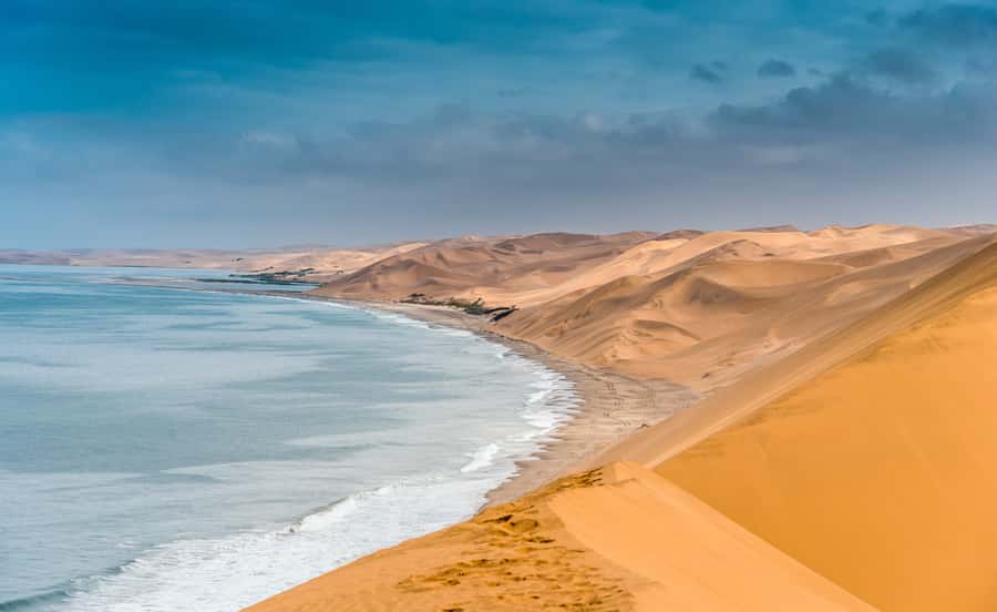 Walvis Bay: Sandwich Harbour Sunset Photography Tour - Beach driving depends on the tide