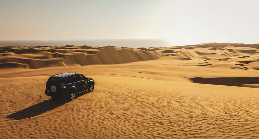 Walvisbay: Sandwich Harbour SUNSET Tour-End It Beautifully - Guides, driving, and the personal-service factor